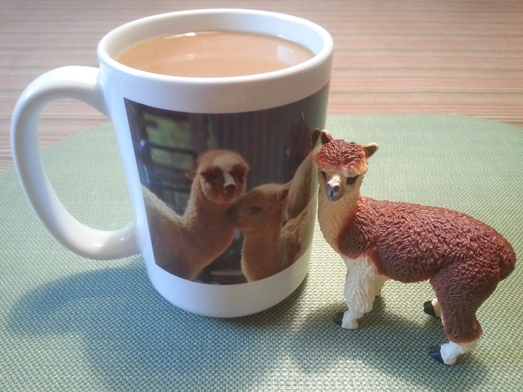 Alpaca drinking Coffee from mug